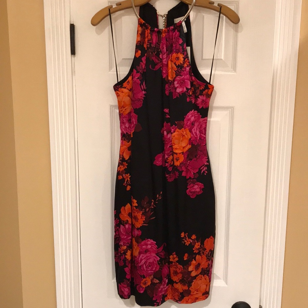 Cache glamorous dress never with tags.